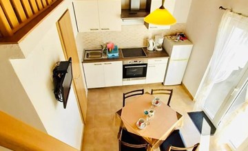 Dachgeschosswohnung auf zwei Etagen mit schönem Meerblick 3