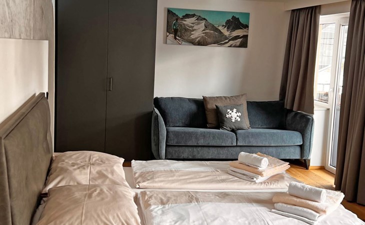 Suite bis zu 4 P. & Wellnessbereich 1