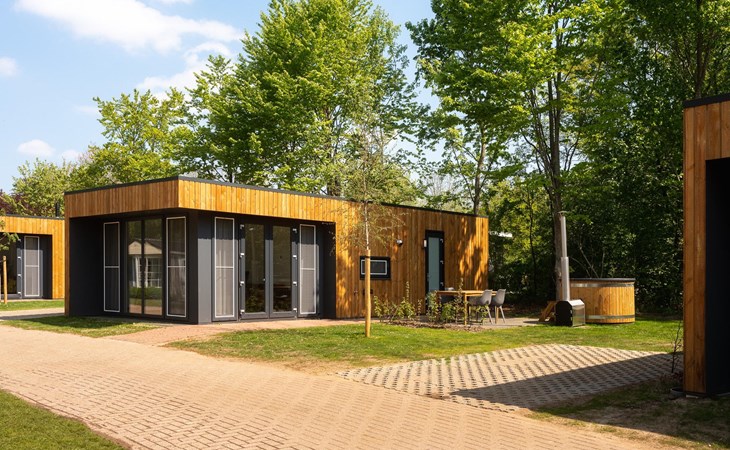 Groepsaccommodatie met hottub (7x Happy Oak Lodge) I 28 personen 1
