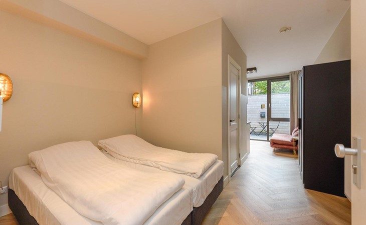 Novallure Hofvliet Short Stay Apartments - Studio met buitenruimte - Achterzijde 1