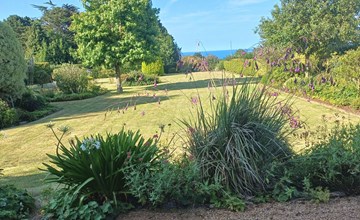 Komforthaus mit Traumgarten und Meerblick 2